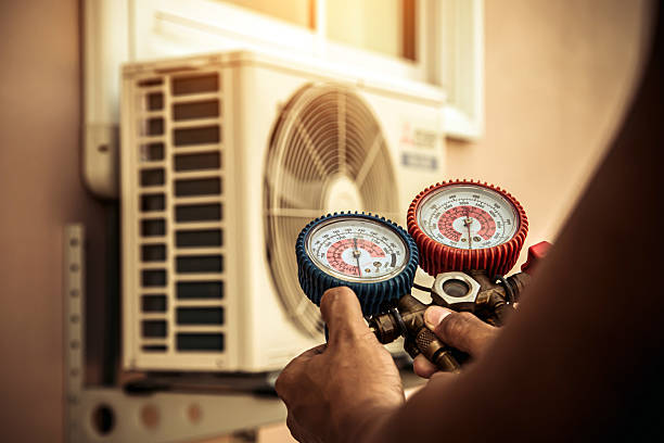 Professional Heat Pump Repair technician working in Grand Rivers, KY
